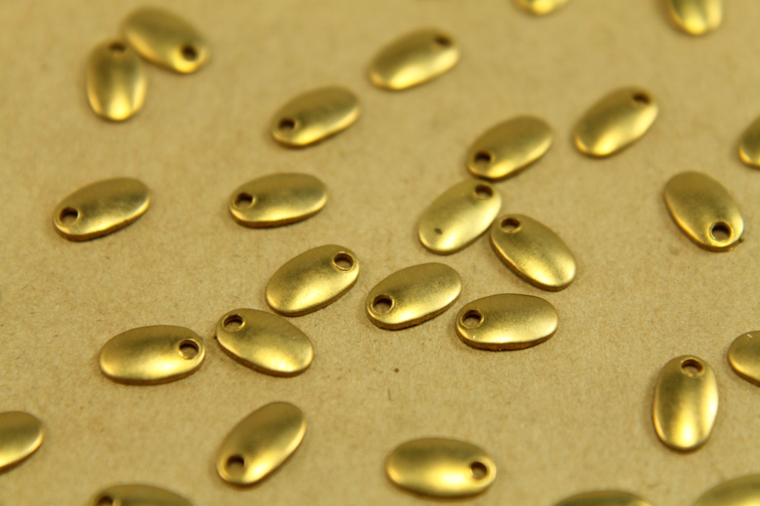 20 pc. Tiny Raw Brass Domed Oval Charms: 7mm by 4.5mm - made in USA | RB-470