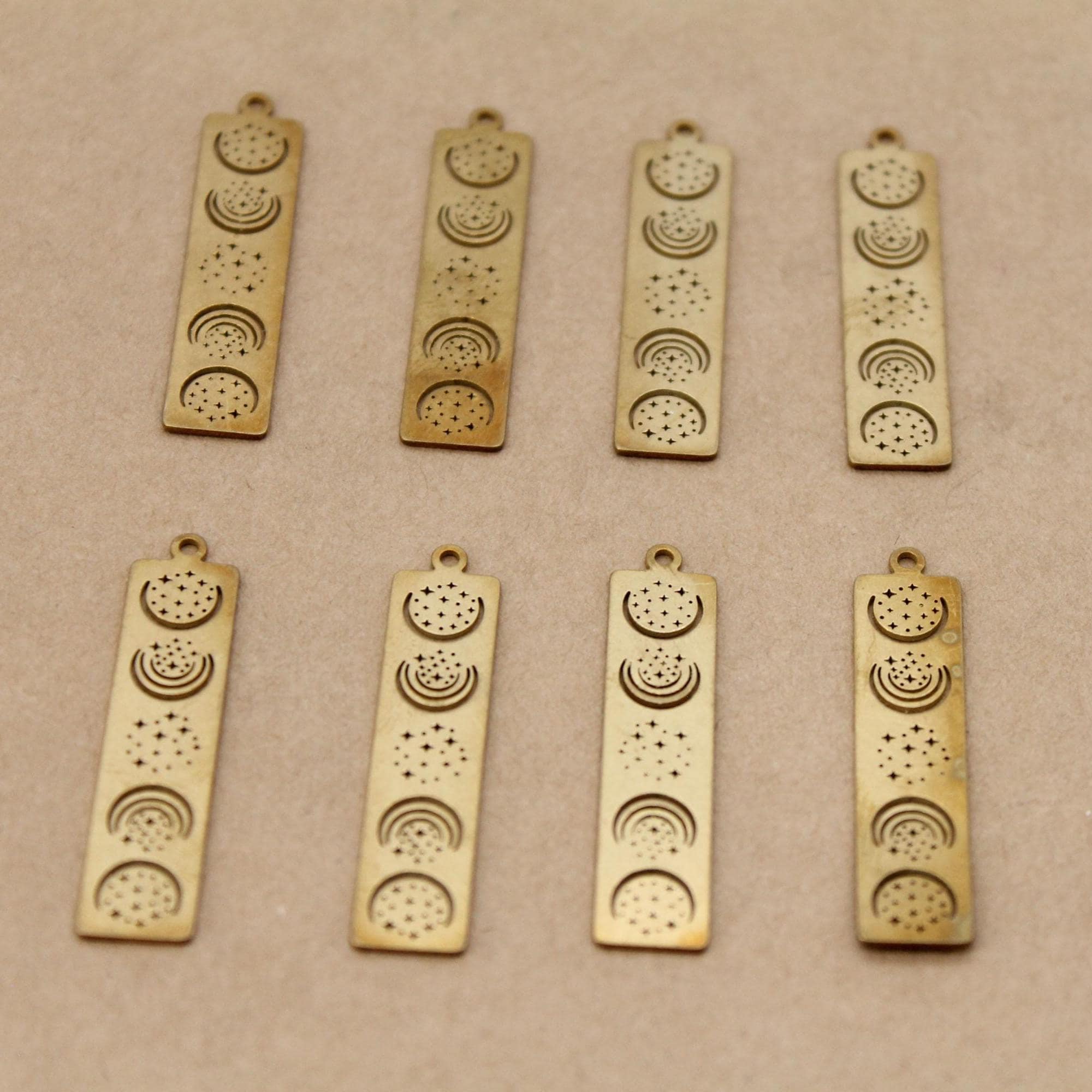1 pc. Raw Brass Celestial Moon Phases Bar Charm, 38mm x 8.5mm | MIS-310*