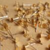 100 pc. Stainless steel earring posts with raw brass pads, 5mm pad * Also available in 500 piece * | FI-263