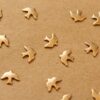 14 pc. Tiny Antique Brass Plated Doves: 8mm by 6mm - made in USA | AB-013