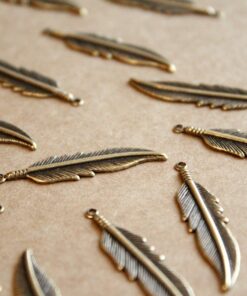 8 pc. Antique Brass Plated Feathers: 34mm by 8.5mm - made in USA | AB-079