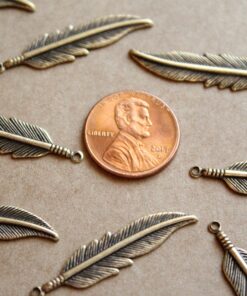 8 pc. Antique Brass Plated Feathers: 34mm by 8.5mm - made in USA | AB-079
