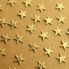 9 pc. Antique Brass Plated Hammered Stars: 7mm by 7mm - made in USA | AB-259