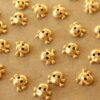 11 pc. Tiny Gold Plated Brass Skulls: 5.5mm by 8mm - made in USA | GLD-038*