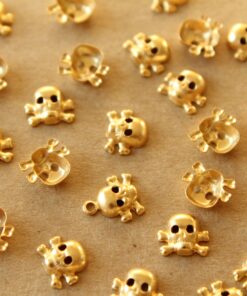 11 pc. Tiny Gold Plated Brass Skulls: 5.5mm by 8mm - made in USA | GLD-038*
