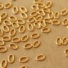 50 pc. 6mm by 4mm Oval 18k Plated Gold Stainless Steel Open Jumprings, 18 gauge | FI-630