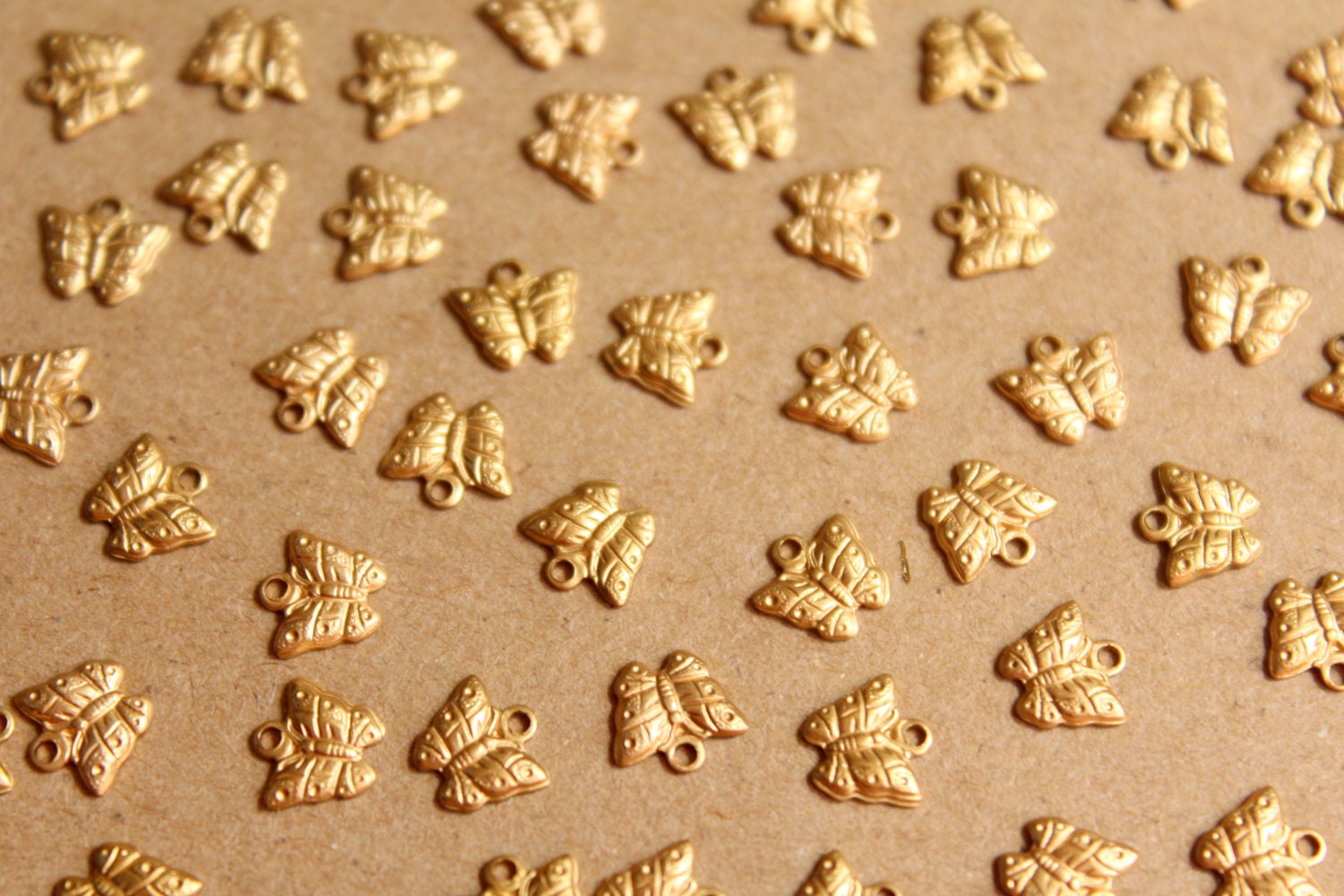 16 pc. Tiny Raw Brass Butterfly Charms: 7mm by 6.5mm - made in USA | RB-864