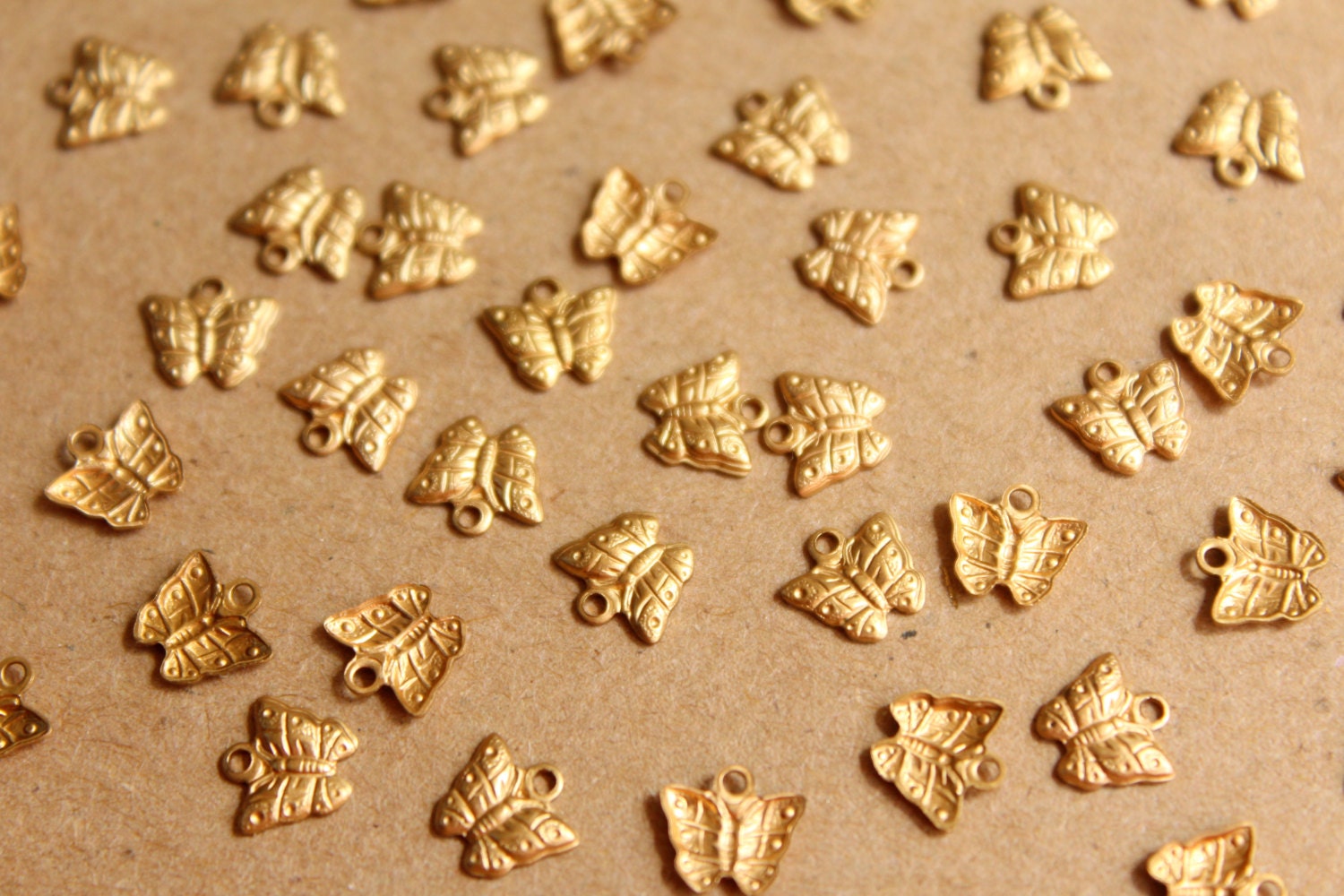 16 pc. Tiny Raw Brass Butterfly Charms: 7mm by 6.5mm - made in USA | RB-864