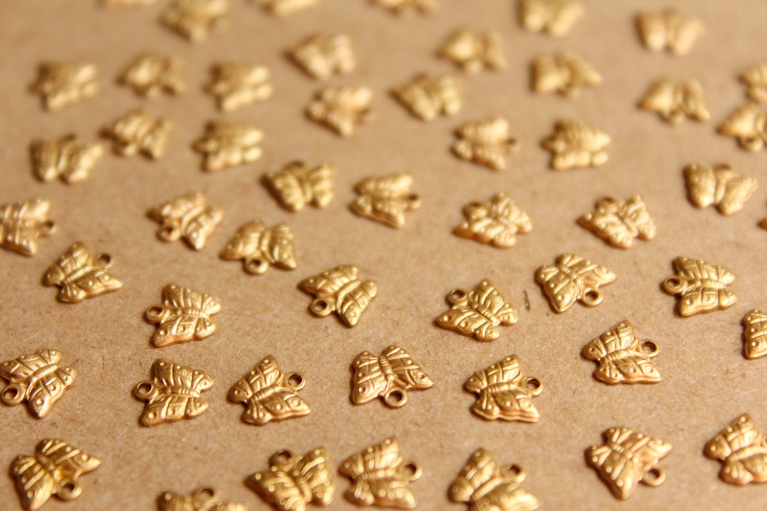 16 pc. Tiny Raw Brass Butterfly Charms: 7mm by 6.5mm - made in USA | RB-864