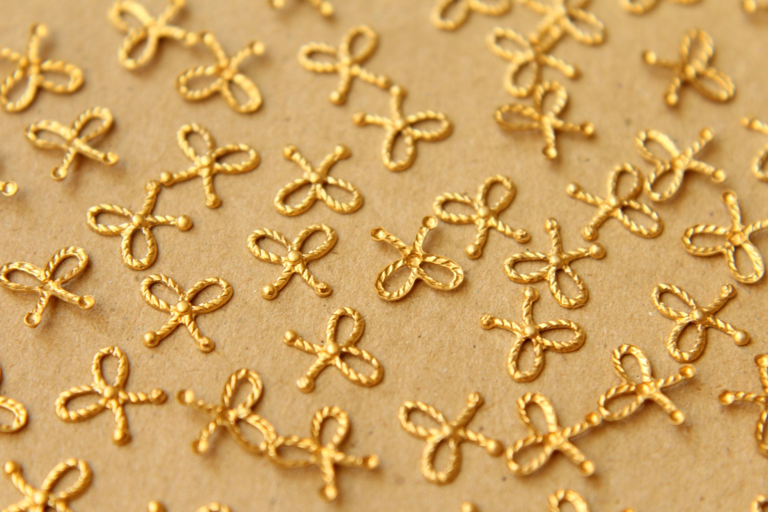 14 pc. Tiny Raw Brass Braided Tied Bows: 7mm by 6.5mm - made in USA | RB-600