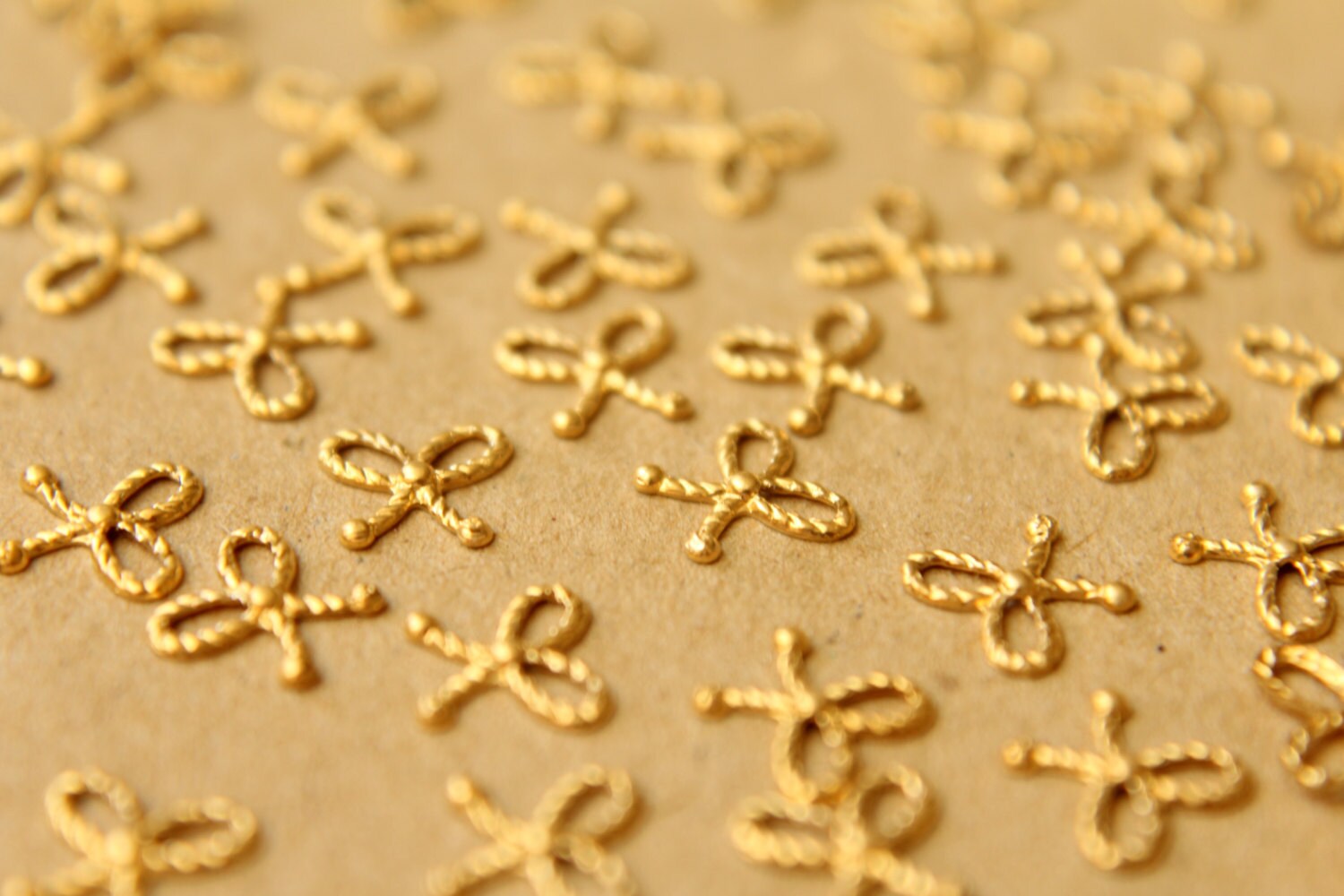 14 pc. Tiny Raw Brass Braided Tied Bows: 7mm by 6.5mm - made in USA | RB-600