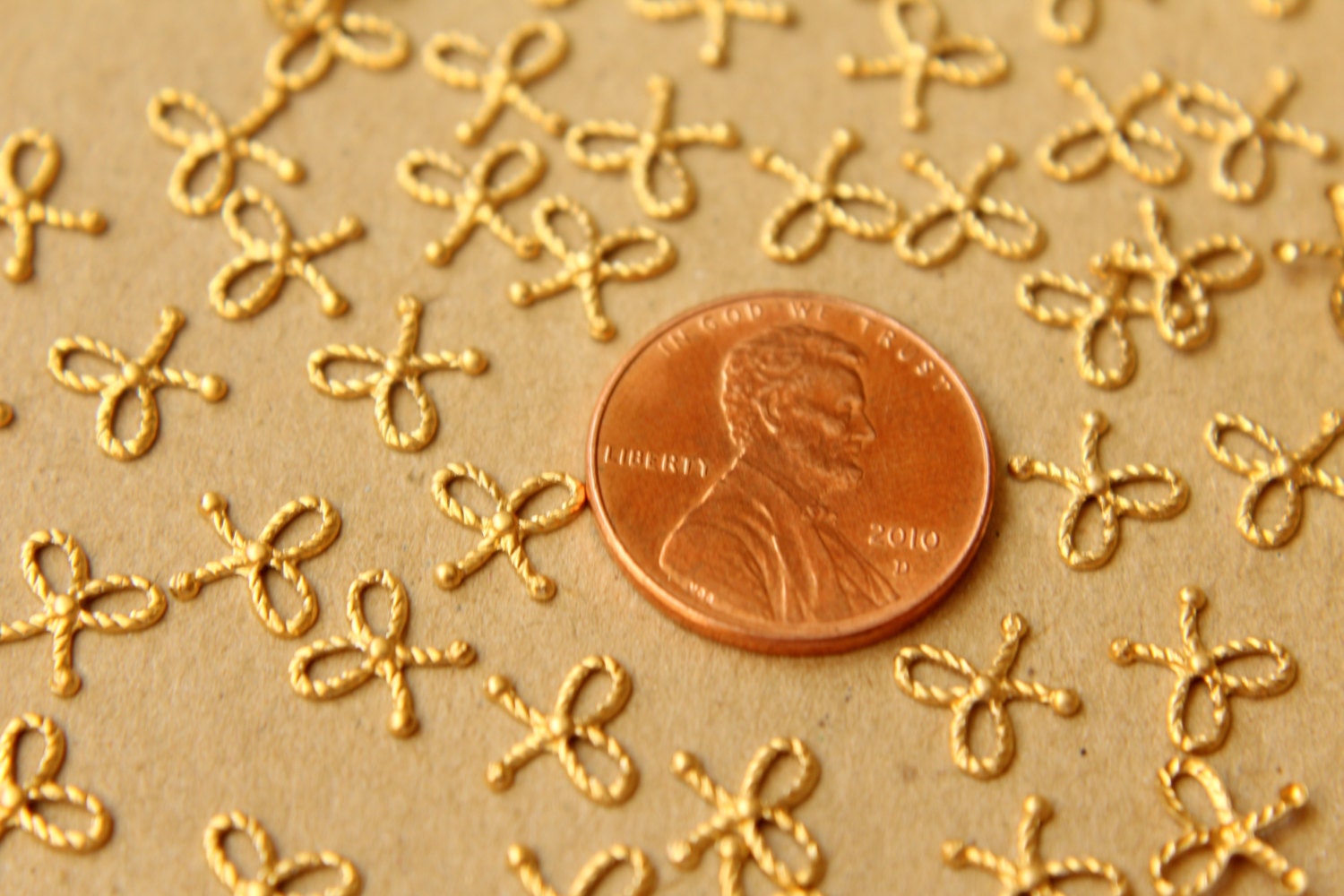 14 pc. Tiny Raw Brass Braided Tied Bows: 7mm by 6.5mm - made in USA | RB-600