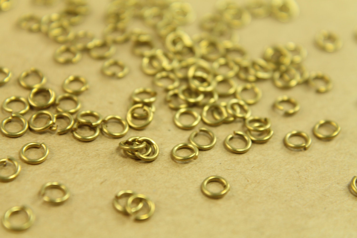 200 pc. 4mm Raw Brass Open Jumprings, 20 gauge | FI-125