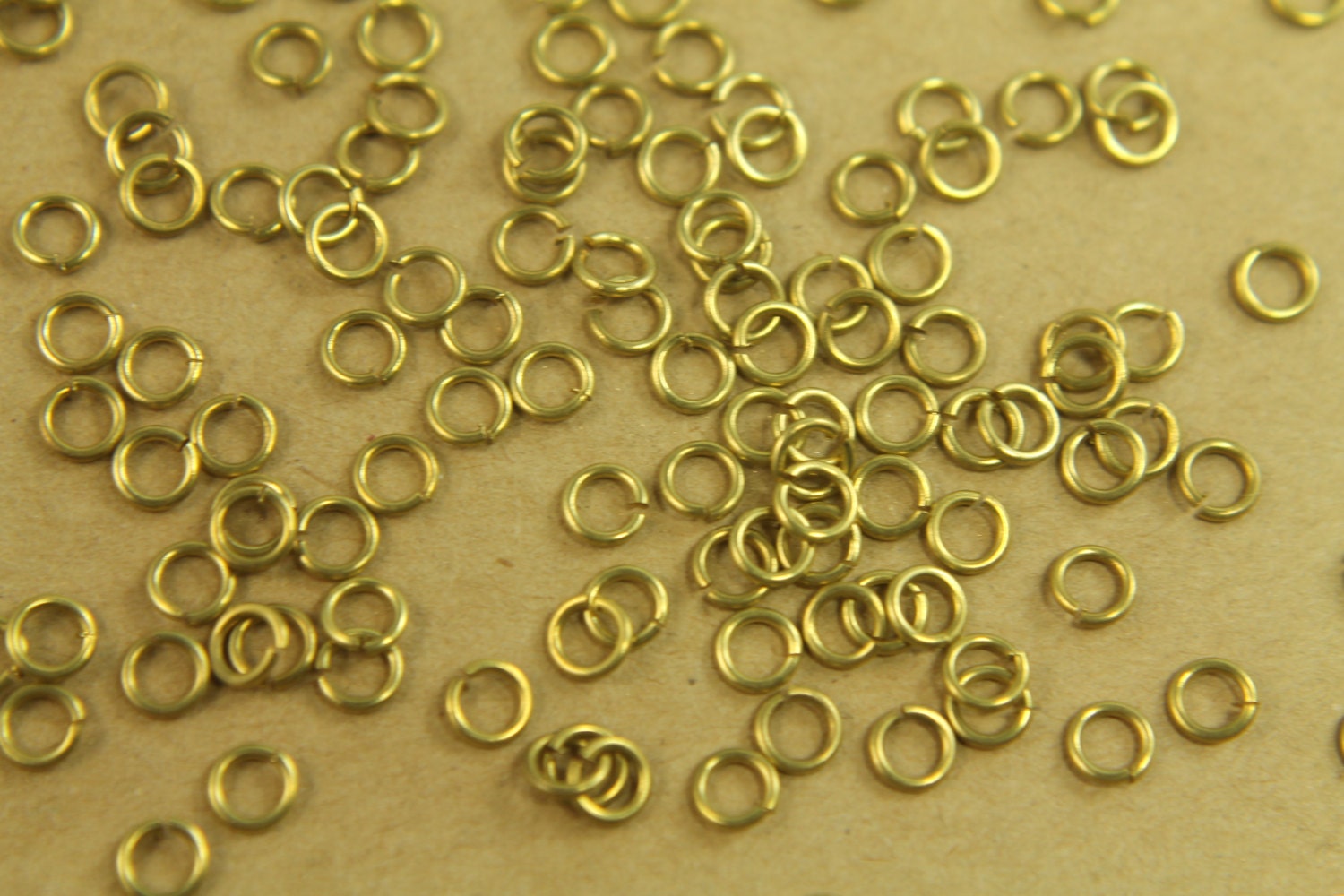 200 pc. 4mm Raw Brass Open Jumprings, 20 gauge | FI-125
