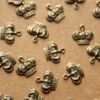 12 pc. Small Antique Brass Plated Detailed Crown Charms: 10mm by 7mm - made in USA | AB-117