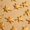 10 pc. Small Raw Brass Hammered Star Burst Charms: 18mm by 13mm - made in USA | RB-1132