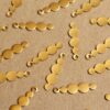 18 pc. Raw Brass Row of Circles Charms: 23mm by 6mm - made in USA | RB-942