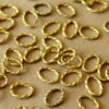 50 pc. Raw Brass Twisted Oval Open Linking Rings, 8.5mm by 6mm | FI-082*
