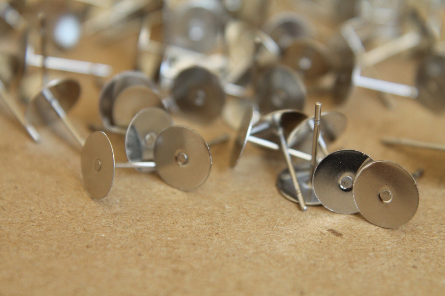 100 pc. Stainless steel earring posts, 8mm pad | FI-097
