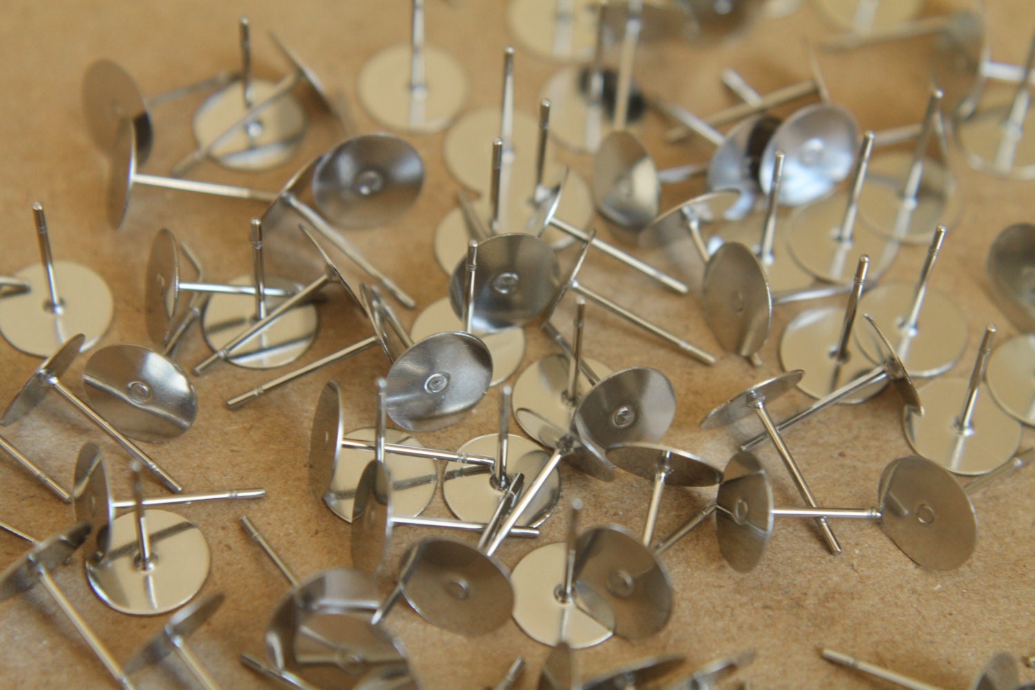 100 pc. Stainless steel earring posts, 8mm pad | FI-097