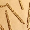 6 pc. Raw Brass Line of Leaves Dangle Charms : 63mm by 5mm - made in USA | RB-1112