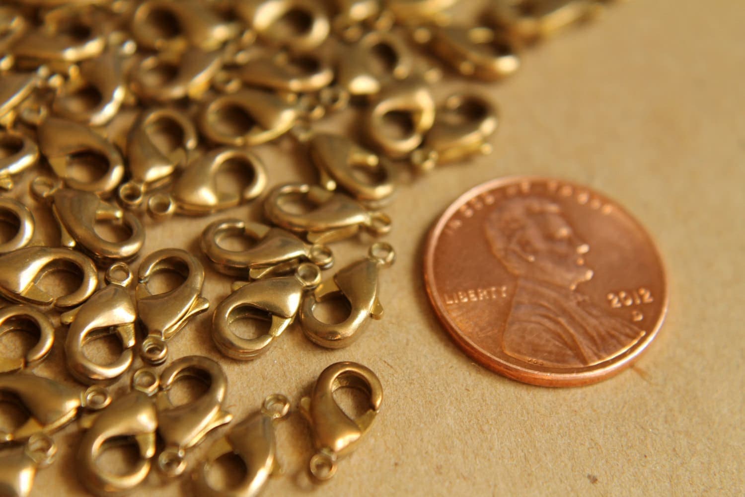 12 pc. Raw Brass Lobster Clasps, 5mm x 10mm | FI-154*