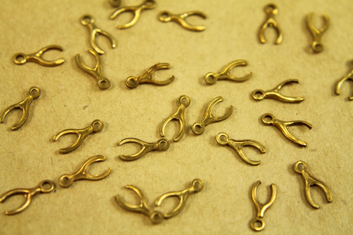 12pc. Tiny Raw Brass Wishbones with Loop: 9.5mm by 5mm - made in USA | RB-365