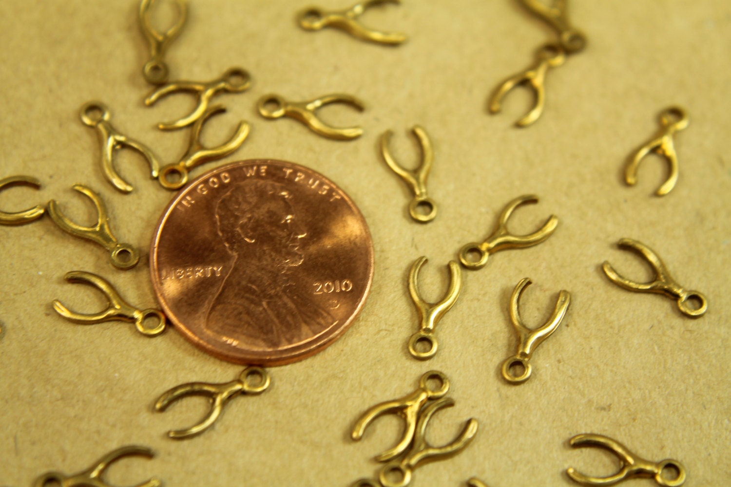 12pc. Tiny Raw Brass Wishbones with Loop: 9.5mm by 5mm - made in USA | RB-365