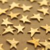 12 pc. Tiny Raw Brass Asymmetrical Hammered Stars: 8mm by 6.5mm - made in USA | RB-211