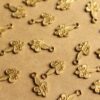 10 pc. Tiny Raw Brass Fleur de Lis Charms: 11.5mm by 6mm - made in USA | RB-810