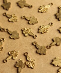 10 pc. Tiny Raw Brass Fleur de Lis Charms: 11.5mm by 6mm - made in USA | RB-810
