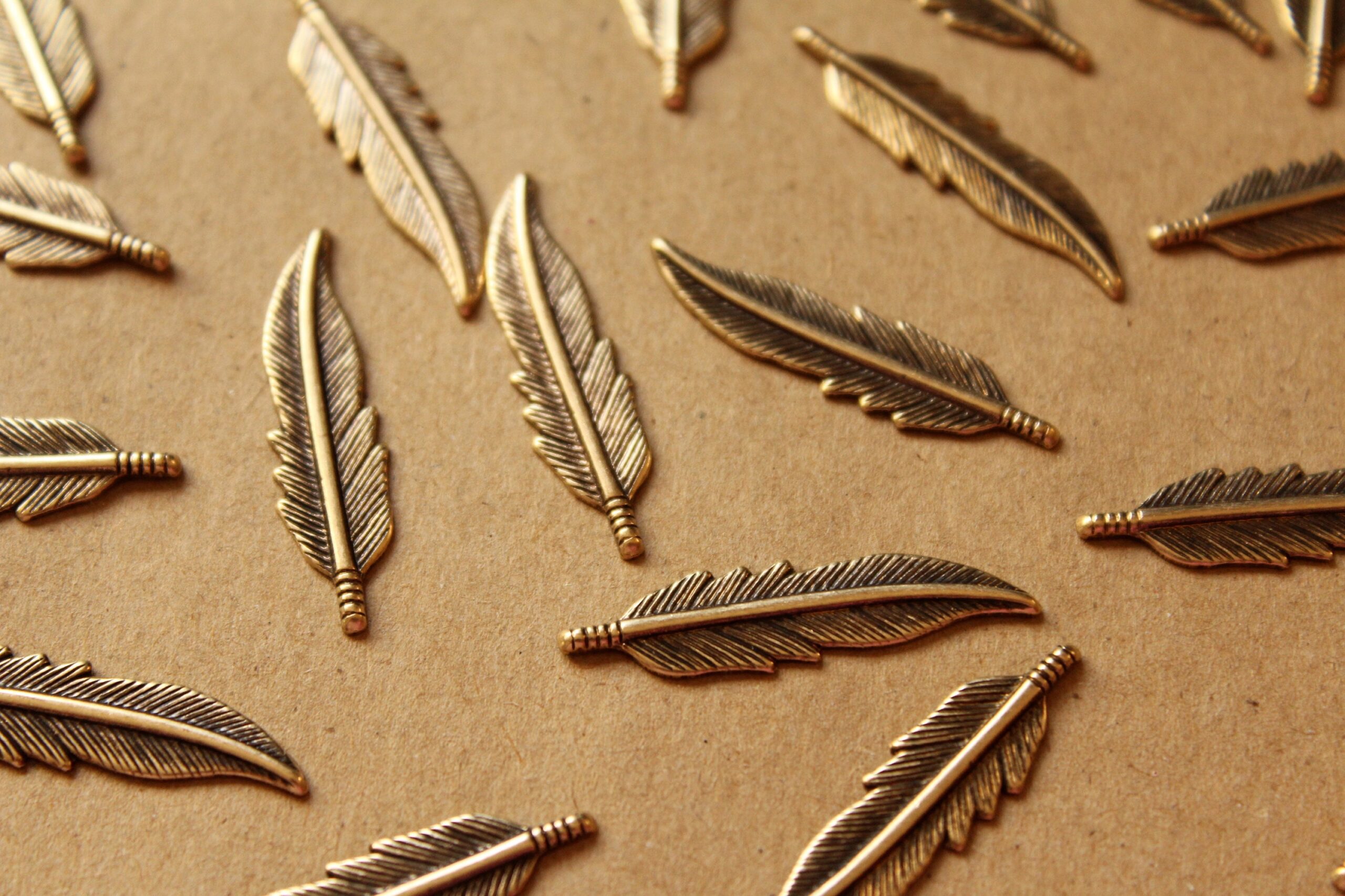 10 pc. Antique Brass Plated Feathers: 32.5mm by 8.5mm - made in USA | AB-019