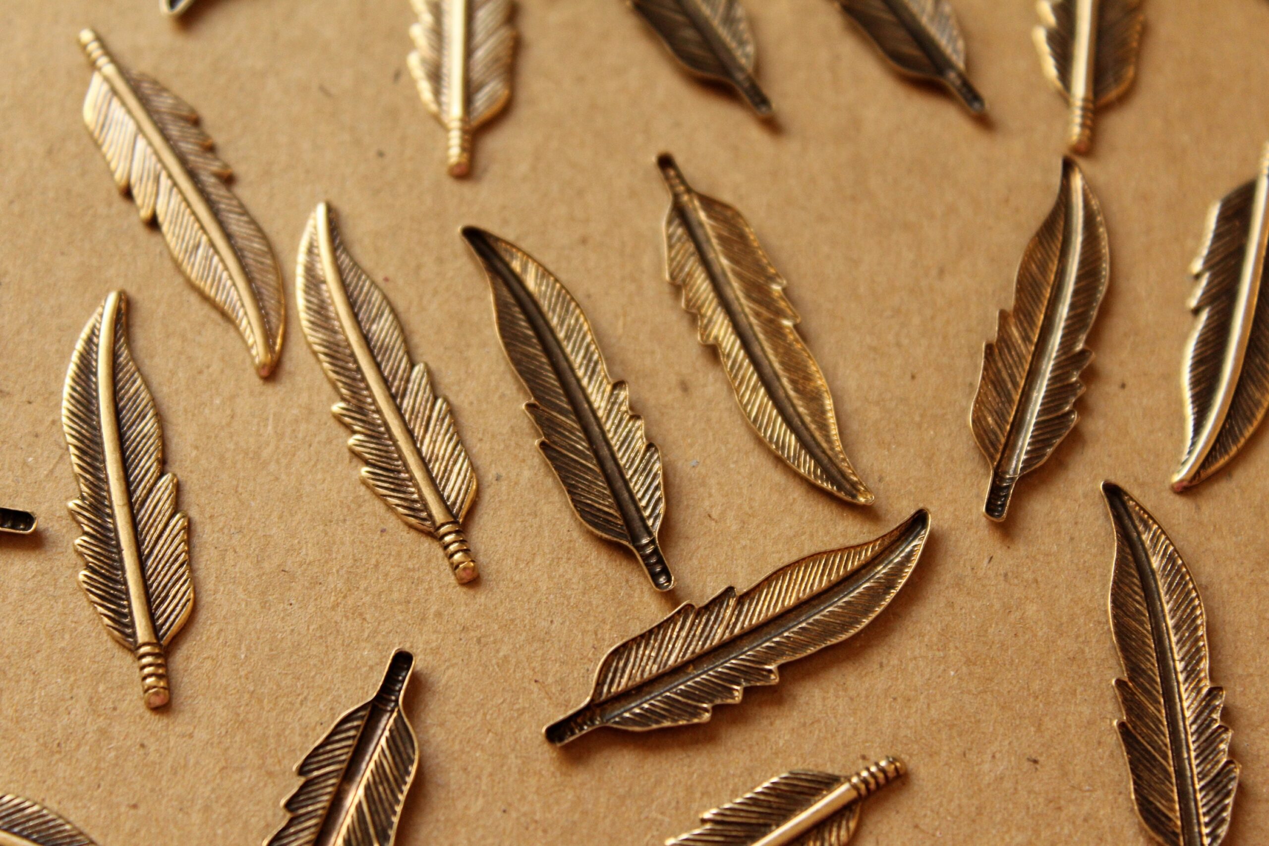 10 pc. Antique Brass Plated Feathers: 32.5mm by 8.5mm - made in USA | AB-019