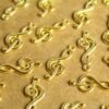 20 pc. Bright Gold Treble Clef Charms: 26mm by 10mm | MIS-260