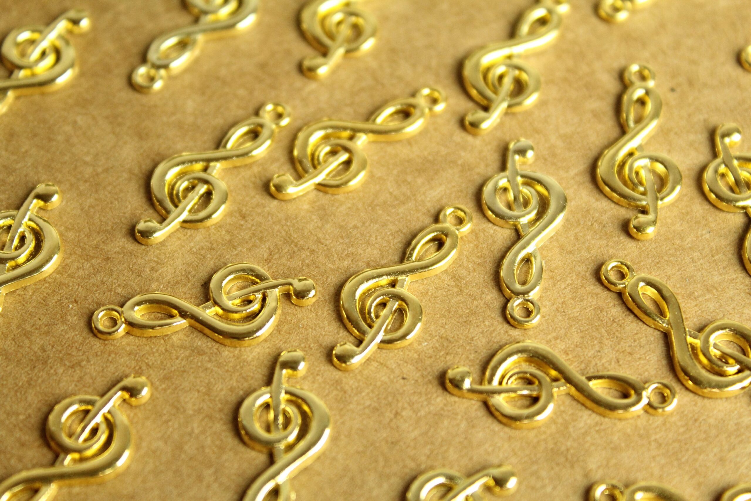 20 pc. Bright Gold Treble Clef Charms: 26mm by 10mm | MIS-260