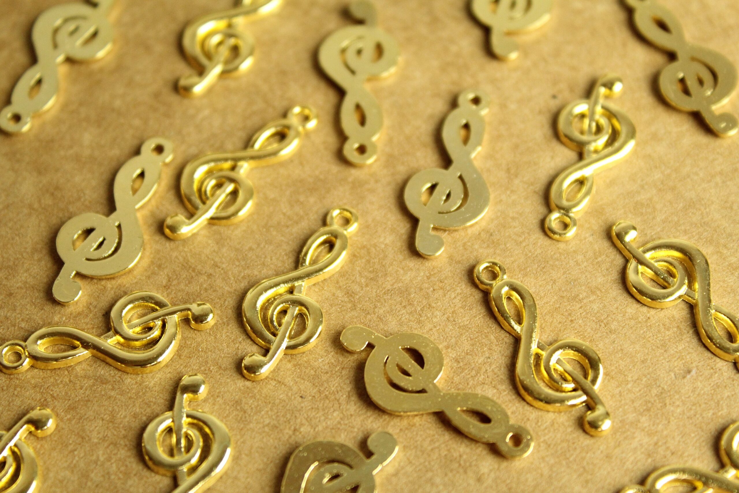 20 pc. Bright Gold Treble Clef Charms: 26mm by 10mm | MIS-260