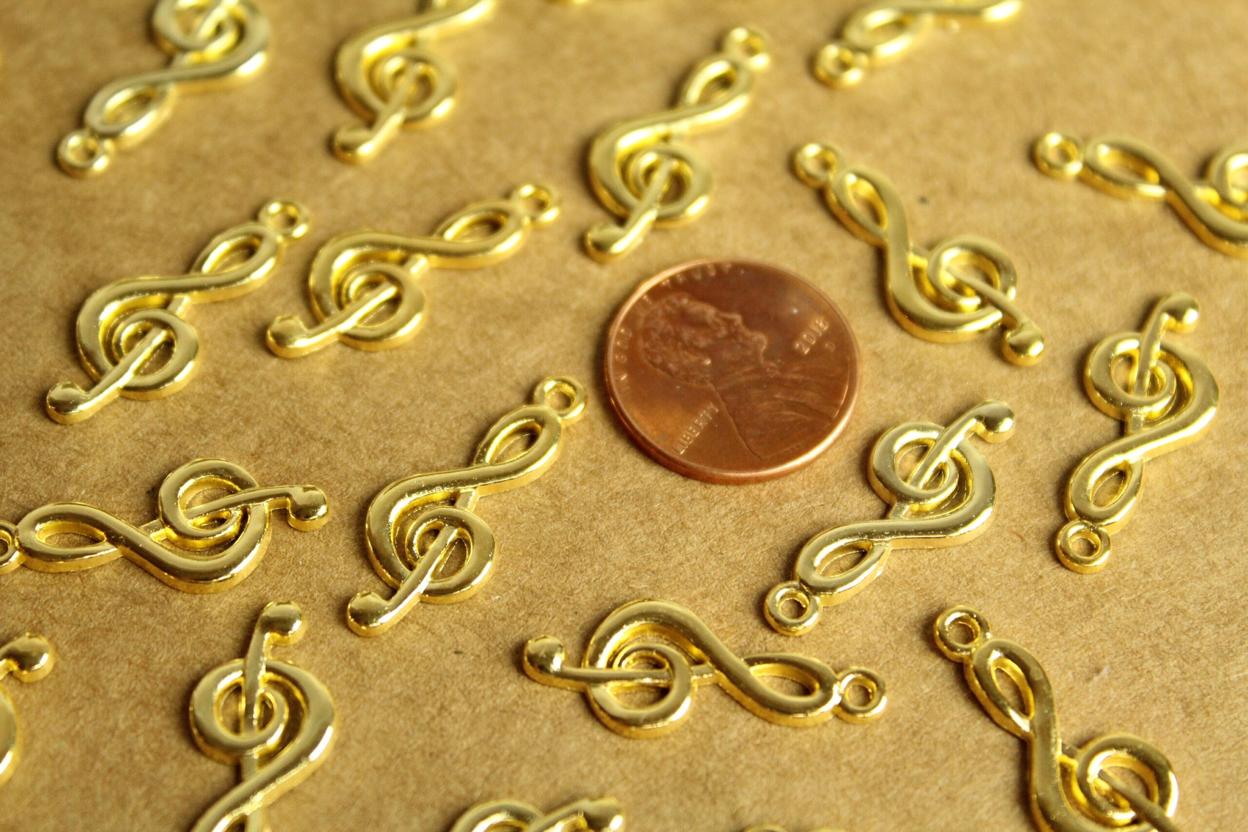 20 pc. Bright Gold Treble Clef Charms: 26mm by 10mm | MIS-260