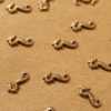 12 pc. Tiny Antique Brass Plated Seahorses: 10mm by 5mm - made in USA | AB-029