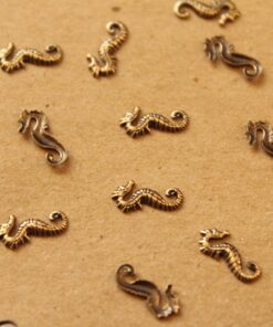 12 pc. Tiny Antique Brass Plated Seahorses: 10mm by 5mm - made in USA | AB-029