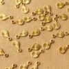 16 pc. Tiny Raw Brass Textured Teardrop Charms with Starburst Design: 9mm by 5mm- made in USA | RB-1210*