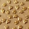 10 pc. Tiny Raw Brass Curved Leaf Charms: 8mm by 6mm - made in USA | RB-952*