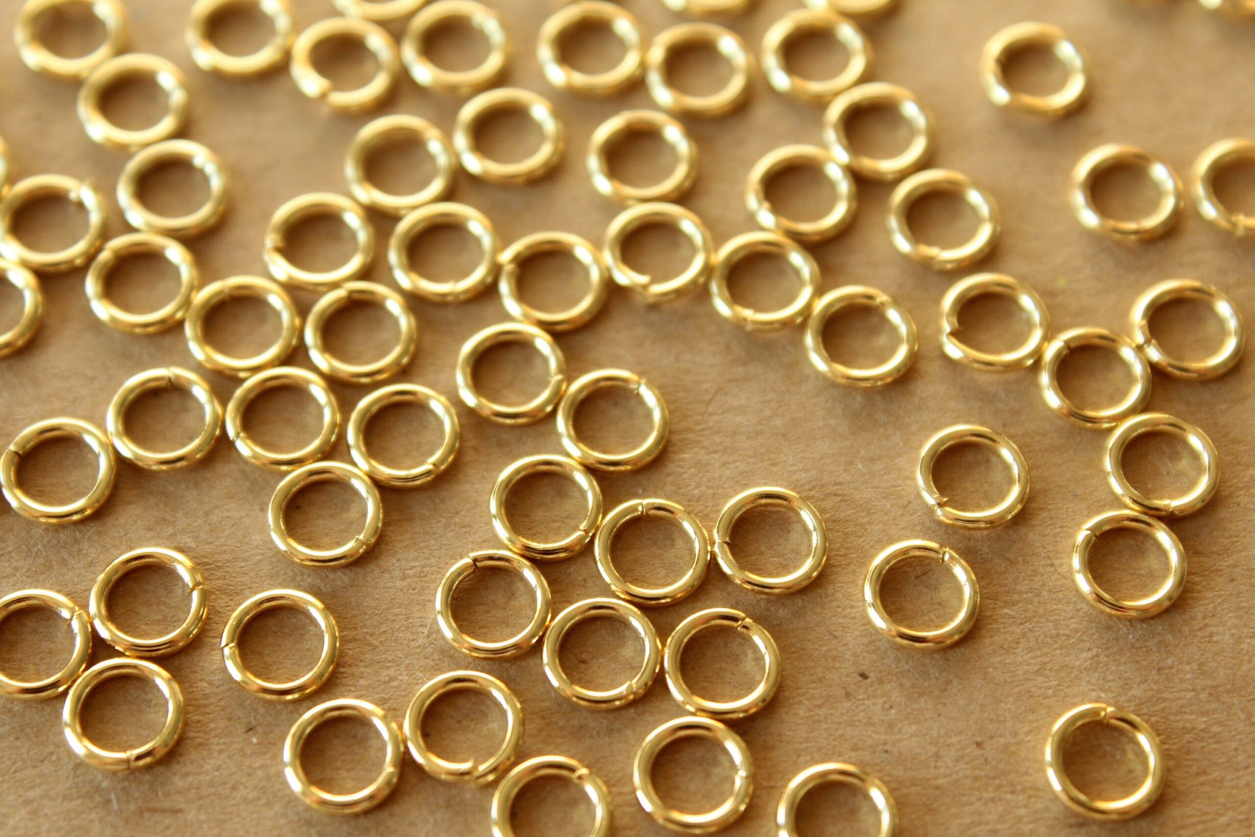 100 pc. 6mm 18k Gold Plated Stainless Steel Jumprings, 18 gauge | FI-212*