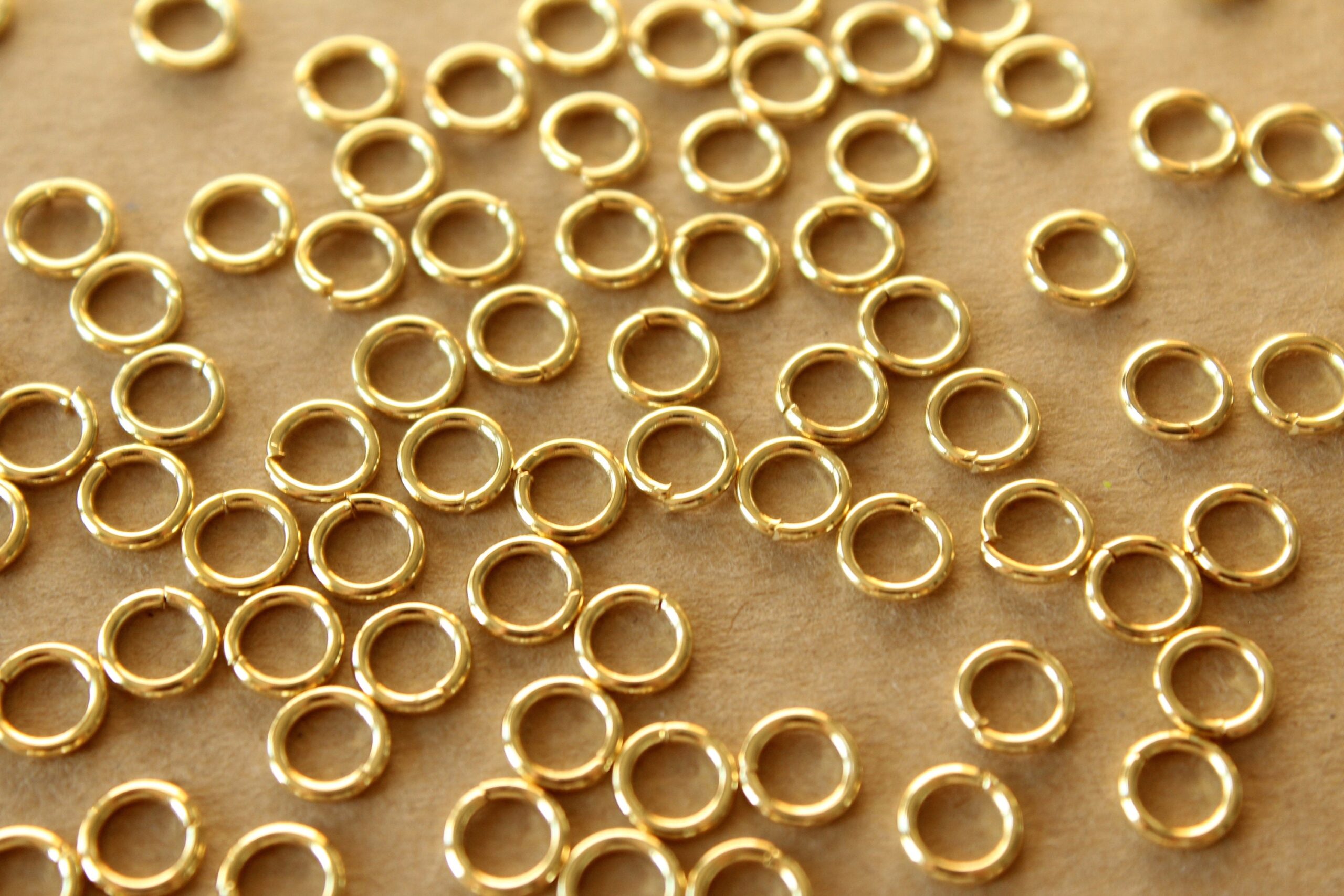 100 pc. 6mm 18k Gold Plated Stainless Steel Jumprings, 18 gauge | FI-212*
