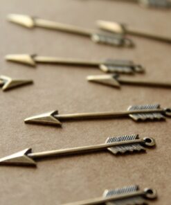 4 pc. Medium Antique Brass Plated Arrows: 33mm by 5mm - made in USA | AB-094