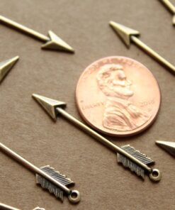 4 pc. Medium Antique Brass Plated Arrows: 33mm by 5mm - made in USA | AB-094
