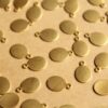 24 pc. Raw Brass Oval Tags: 11mm by 7mm - made in USA | RB-769