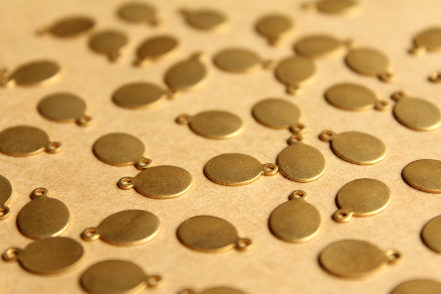 24 pc. Raw Brass Oval Tags: 11mm by 7mm - made in USA | RB-769