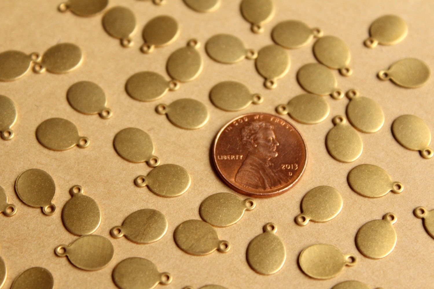 24 pc. Raw Brass Oval Tags: 11mm by 7mm - made in USA | RB-769