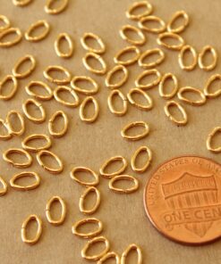 50 pc. 6mm by 4mm Oval 18k Plated Gold Stainless Steel Open Jumprings, 18 gauge | FI-630