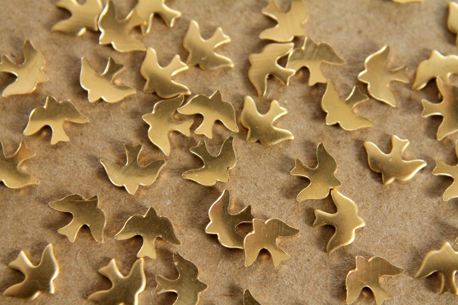 24 pc. Tiny Raw Brass Doves: 8mm by 6mm - made in USA | RB-062